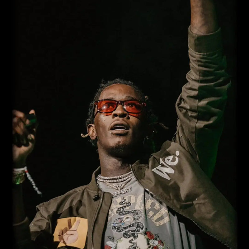 Young Thug spotted on tour wearing GODSPEED
