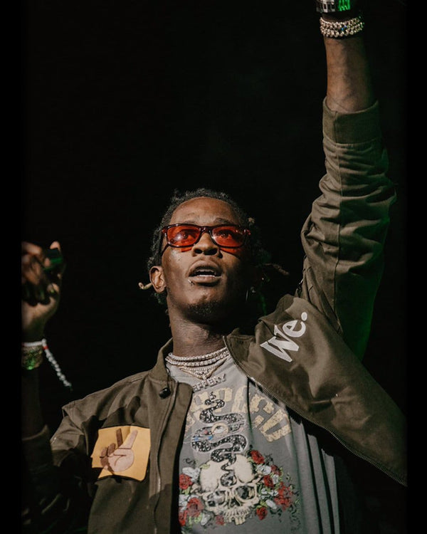 Young Thug spotted on tour wearing GODSPEED